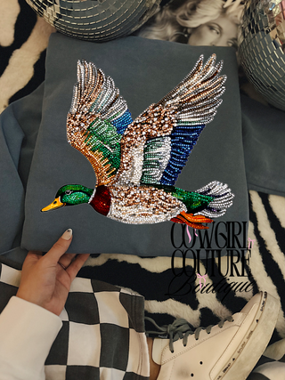 Faux rhinestone flying mallard